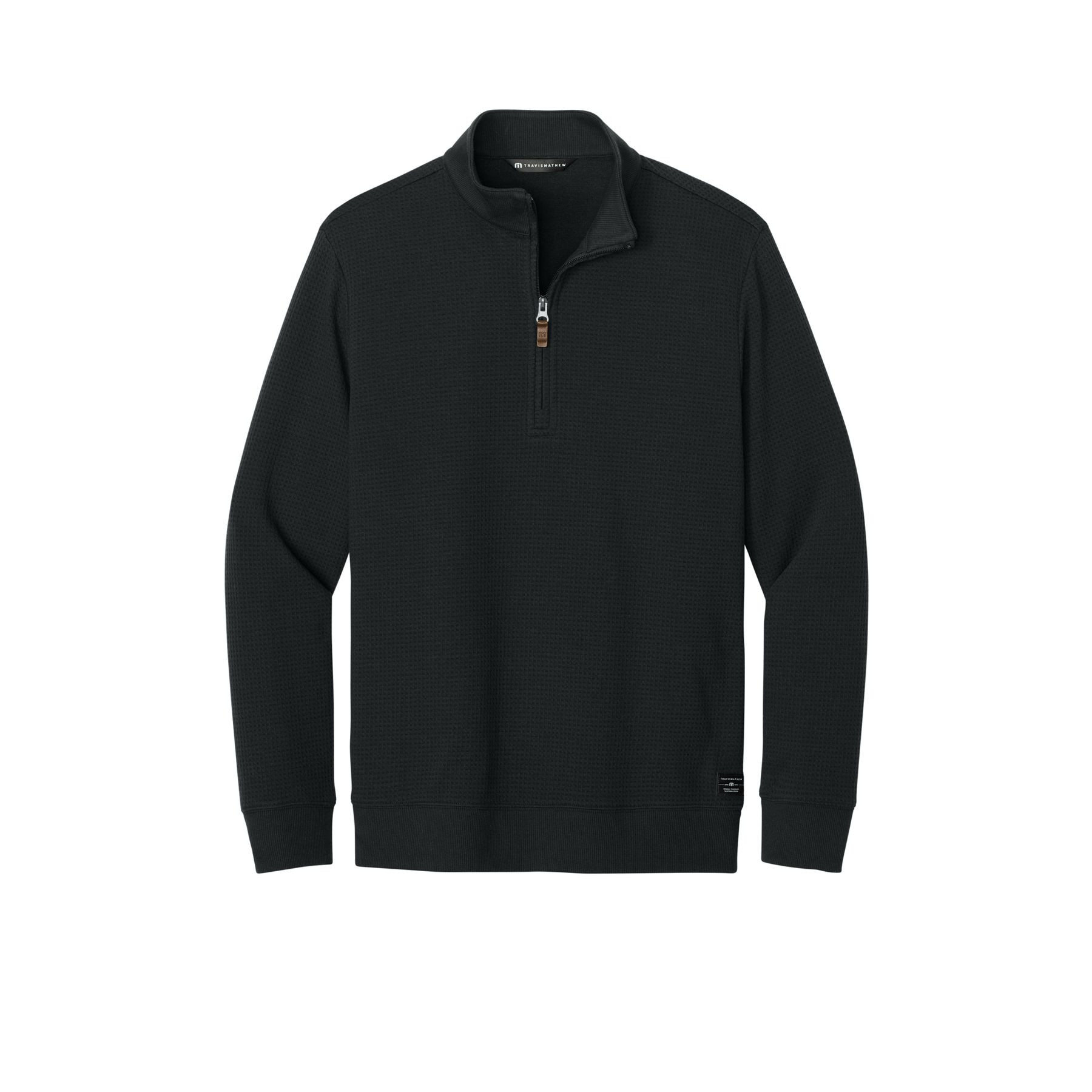 Black TravisMathew Waffle 1/4-Zip a lightweight waffle-knit pullover with a quarter-zip front, rib-knit collar, cuffs, and hem, leather zipper pull, and TravisMathew logo patch, offering breathable warmth and a refined casual look for golf, work, travel, and everyday wear.