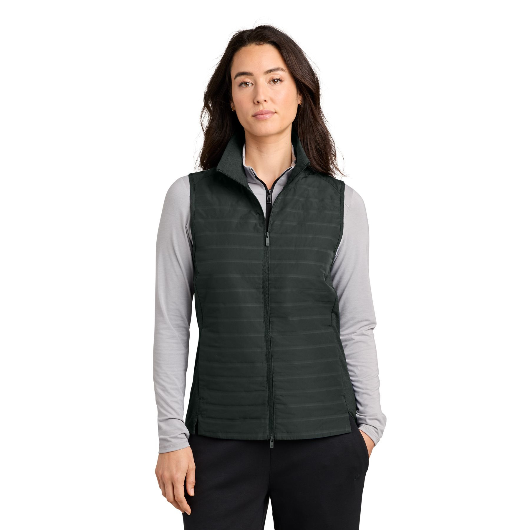 Blacktop OGIO® Women’s Driveline Hybrid Vest a lightweight hybrid vest with a quilted water-repellent front and back, stretch knit side panels for mobility, full-length two-way zipper, zippered hand pockets, stand collar, and a flattering curved hem, designed for layering, travel, work, golf, and outdoor activities.