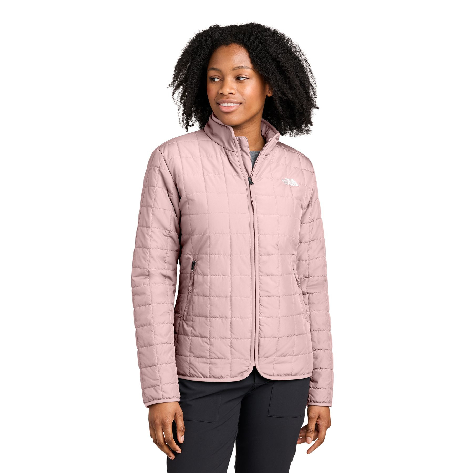 Metal Pink The North Face® Women’s Iron Drift Quilted Jacket a lightweight insulated quilted jacket with a recycled polyester shell, non-PFC durable water-repellent finish, full-length reverse-coil zipper, stand collar, secure zippered hand pockets, elastic-bound cuffs, and embroidered The North Face® logos, designed for lightweight warmth, layering, commuting, and everyday outdoor wear.