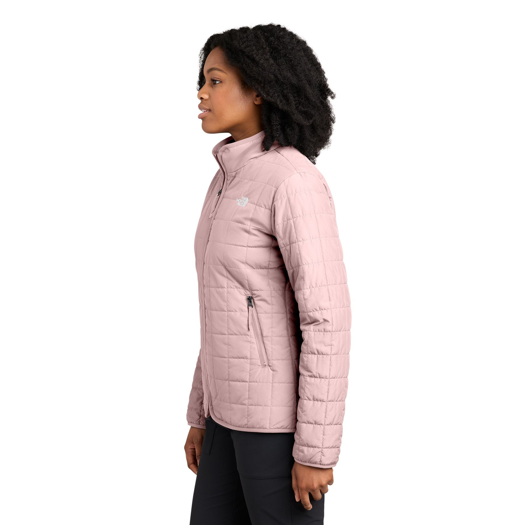 Metal Pink The North Face® Women’s Iron Drift Quilted Jacket a lightweight insulated quilted jacket with a recycled polyester shell, non-PFC durable water-repellent finish, full-length reverse-coil zipper, stand collar, secure zippered hand pockets, elastic-bound cuffs, and embroidered The North Face® logos, designed for lightweight warmth, layering, commuting, and everyday outdoor wear.