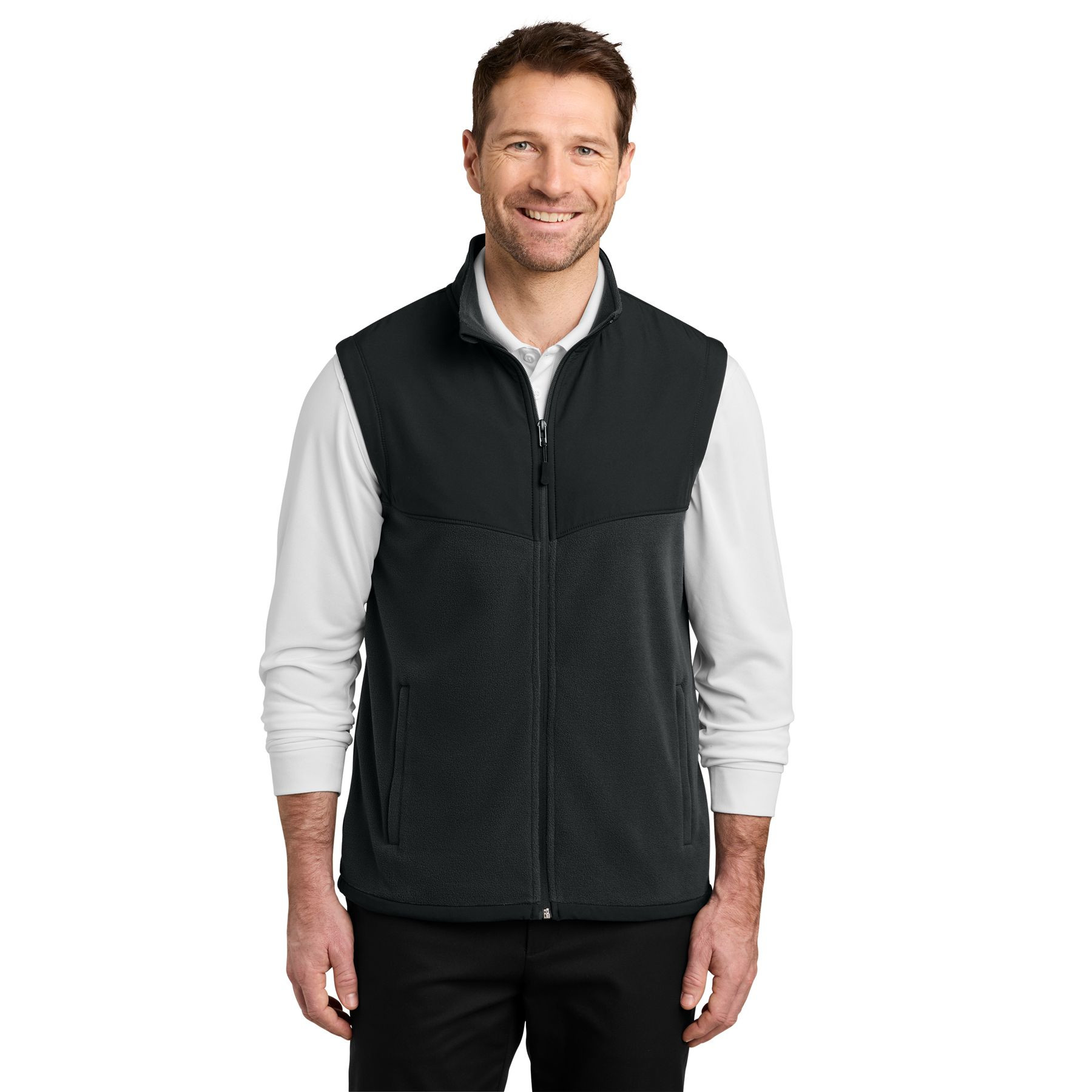 Black fleece vest with a zip-through cadet collar, full-length zipper, zippered front pockets, stretch woven shoulder overlay, and adjustable drawcord hem.