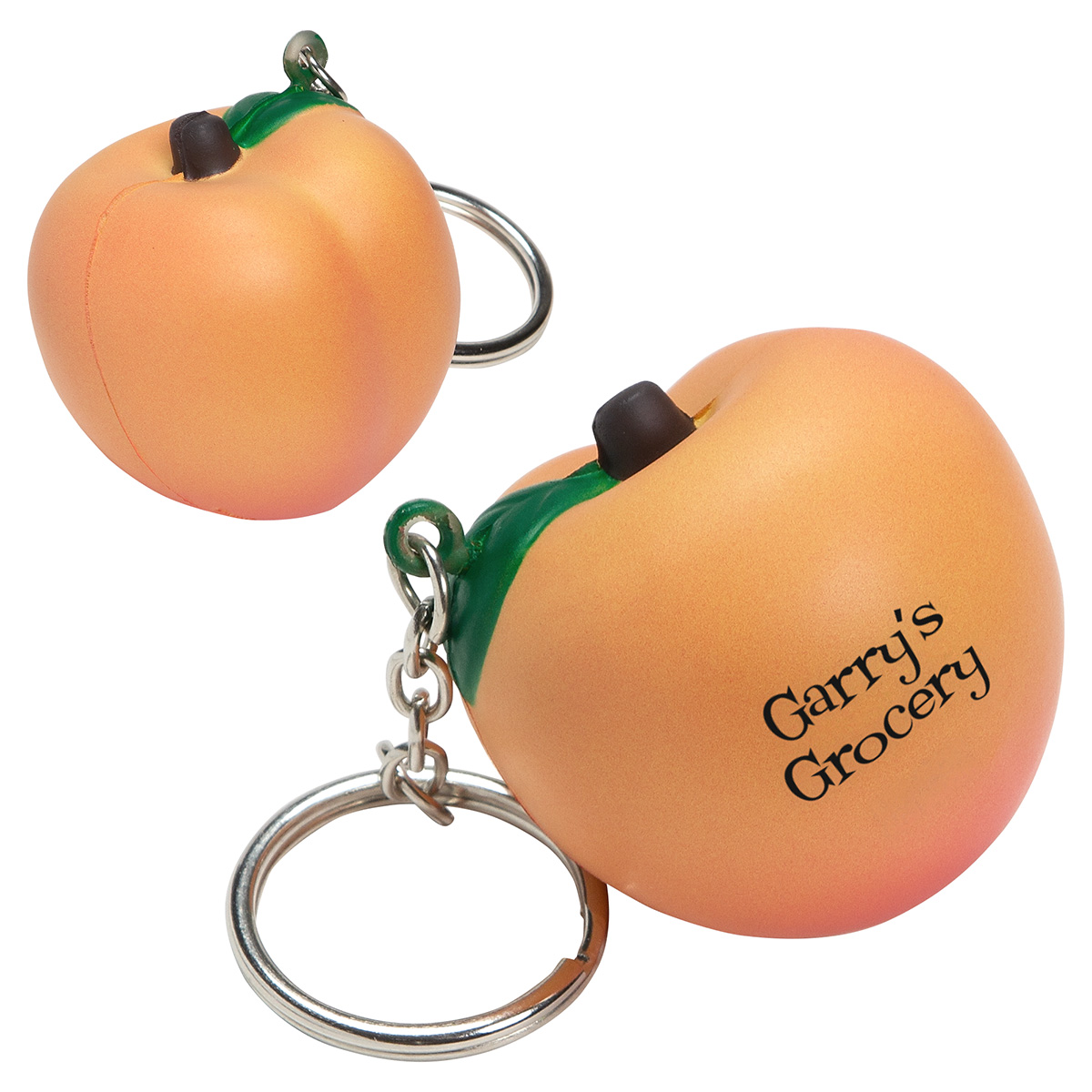 Peach-shaped polyurethane stress reliever key chain with a smooth side and customizable imprint area.