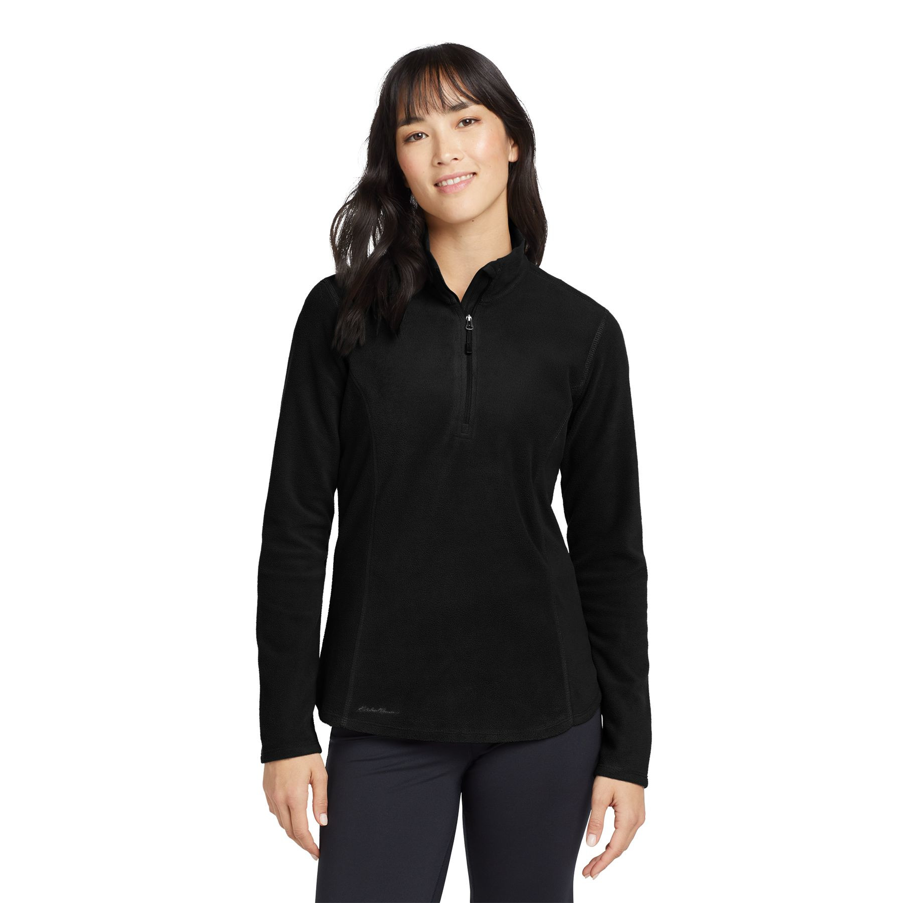 Black Eddie Bauer women's lightweight 1/2-zip microfleece jacket with low-pill finish, princess seams, reverse coil zipper, and open cuffs and hem for comfortable layering.