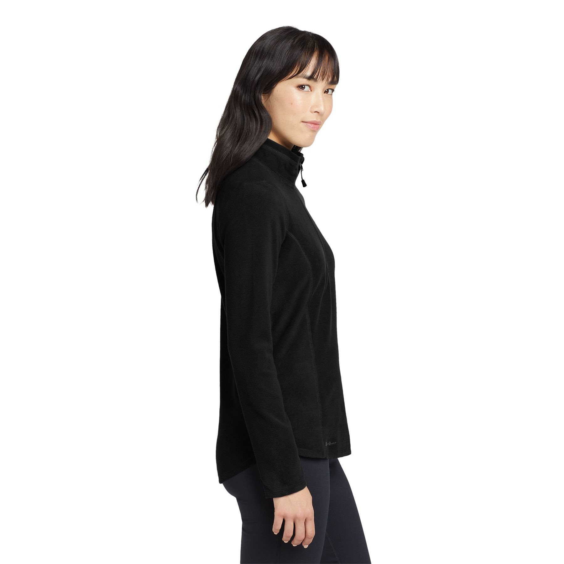 Black Eddie Bauer women's lightweight 1/2-zip microfleece jacket with low-pill finish, princess seams, reverse coil zipper, and open cuffs and hem for comfortable layering.