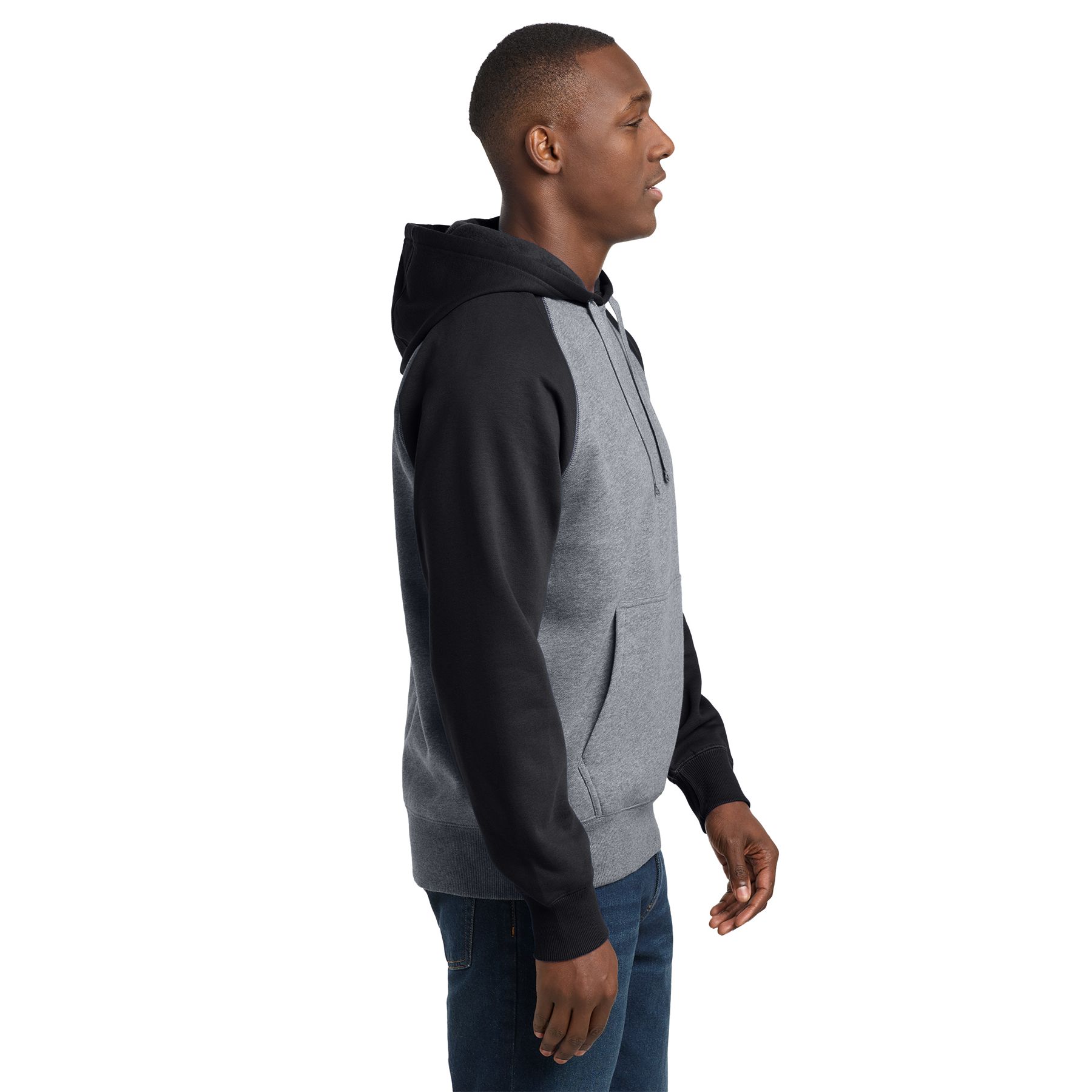 Black and vintage heather colorblocked pullover hooded sweatshirt with a three-panel hood, raglan sleeves, rib knit cuffs and hem, and front pouch pocket.