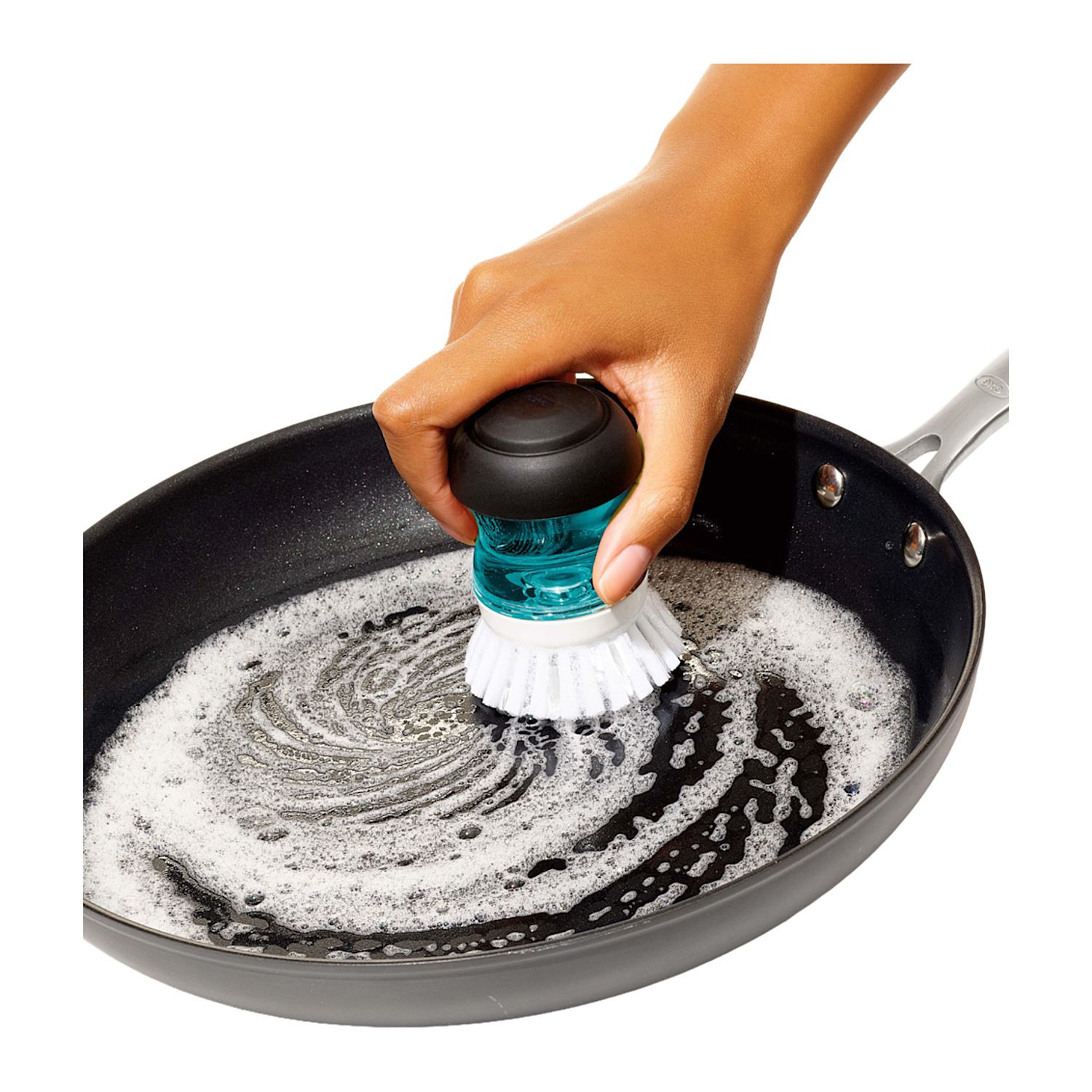 Black OXO Good Grips Soap Dispensing Palm Brush Storage Set with compact countertop holder, white and gray design, durable nylon bristles, and soap-dispensing palm brush for convenient dishwashing and kitchen cleanup.
