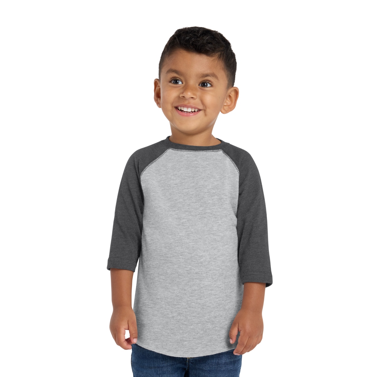 Baseball-style tee with contrast raglan sleeves, flatlock stitching, ribbed collar, and shirttail hem.
