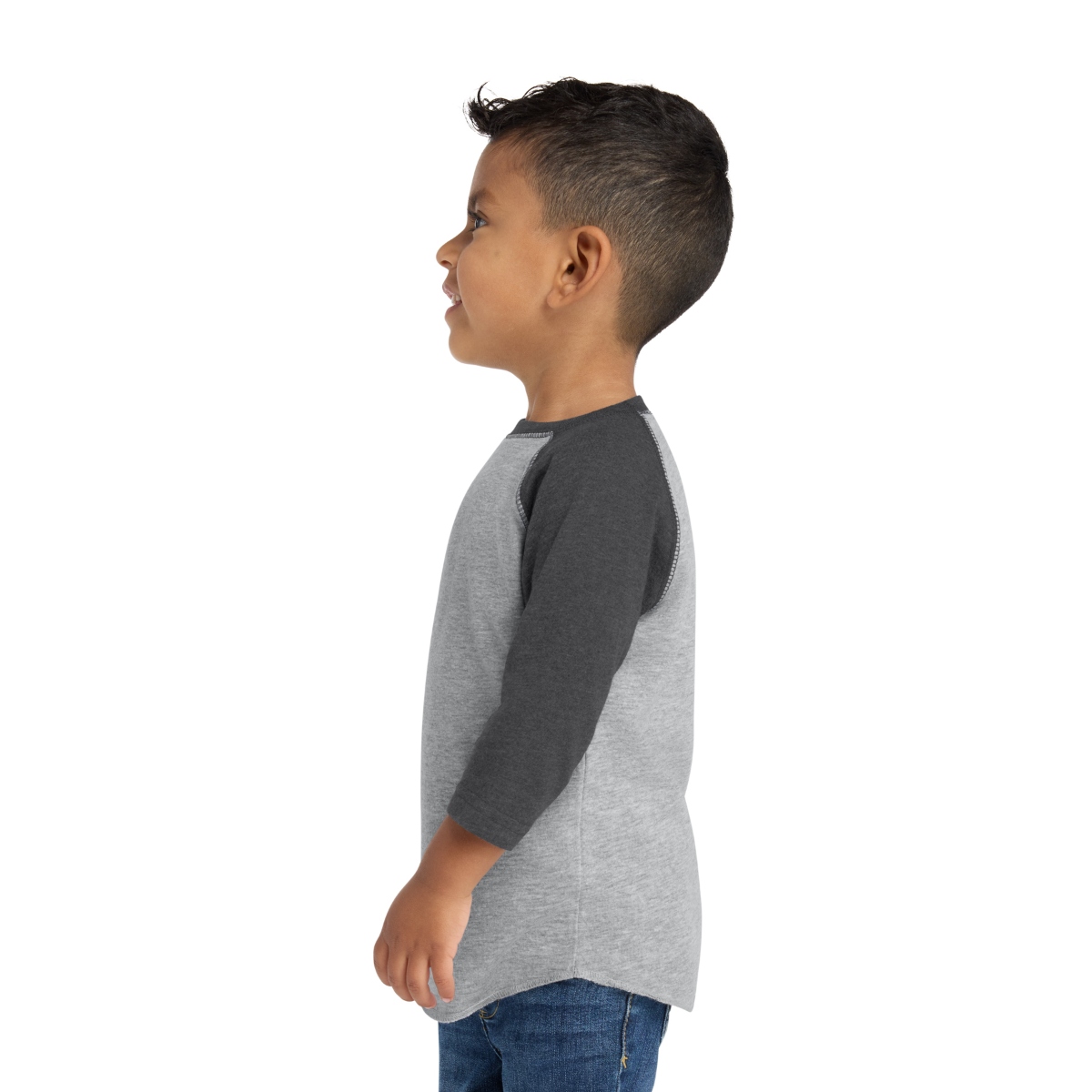 Baseball-style tee with contrast raglan sleeves, flatlock stitching, ribbed collar, and shirttail hem.