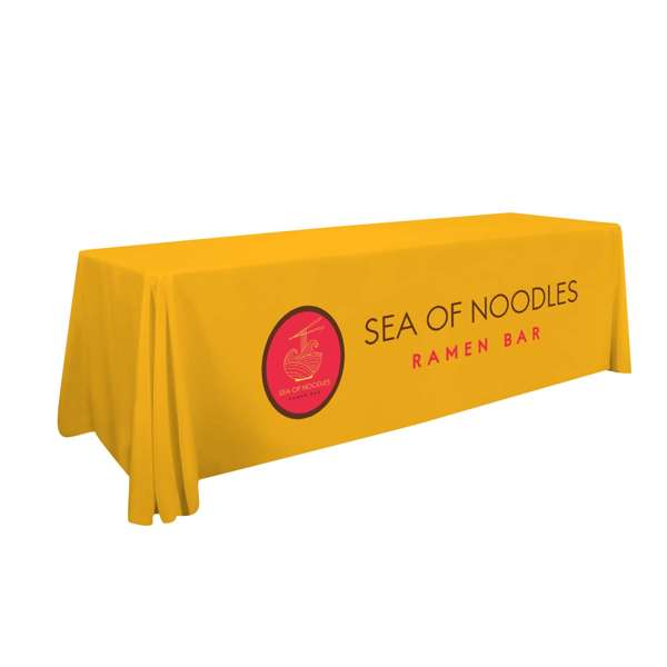 Recycled polyester table throw with four-sided coverage, draped corners, front imprint, and clean serged edges.