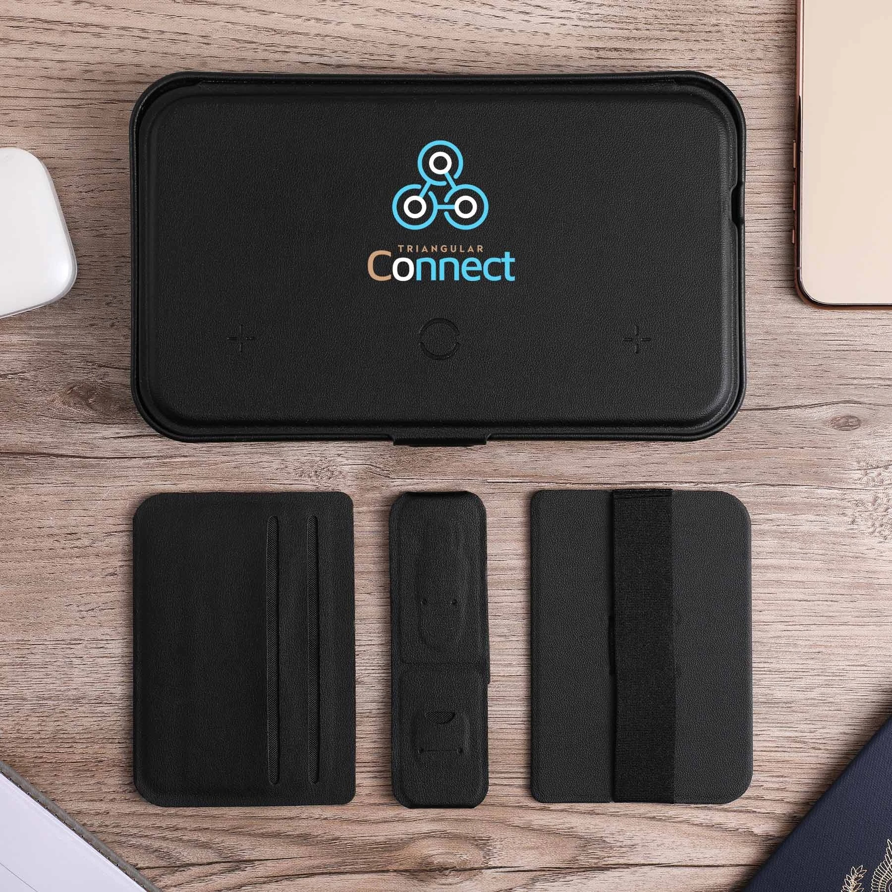 Wireless charging for phone, earbuds, and watch; hard shell carrying case; magnetic lid closure; adjustable magnetic dividers; magnetic lid doubles as a stand