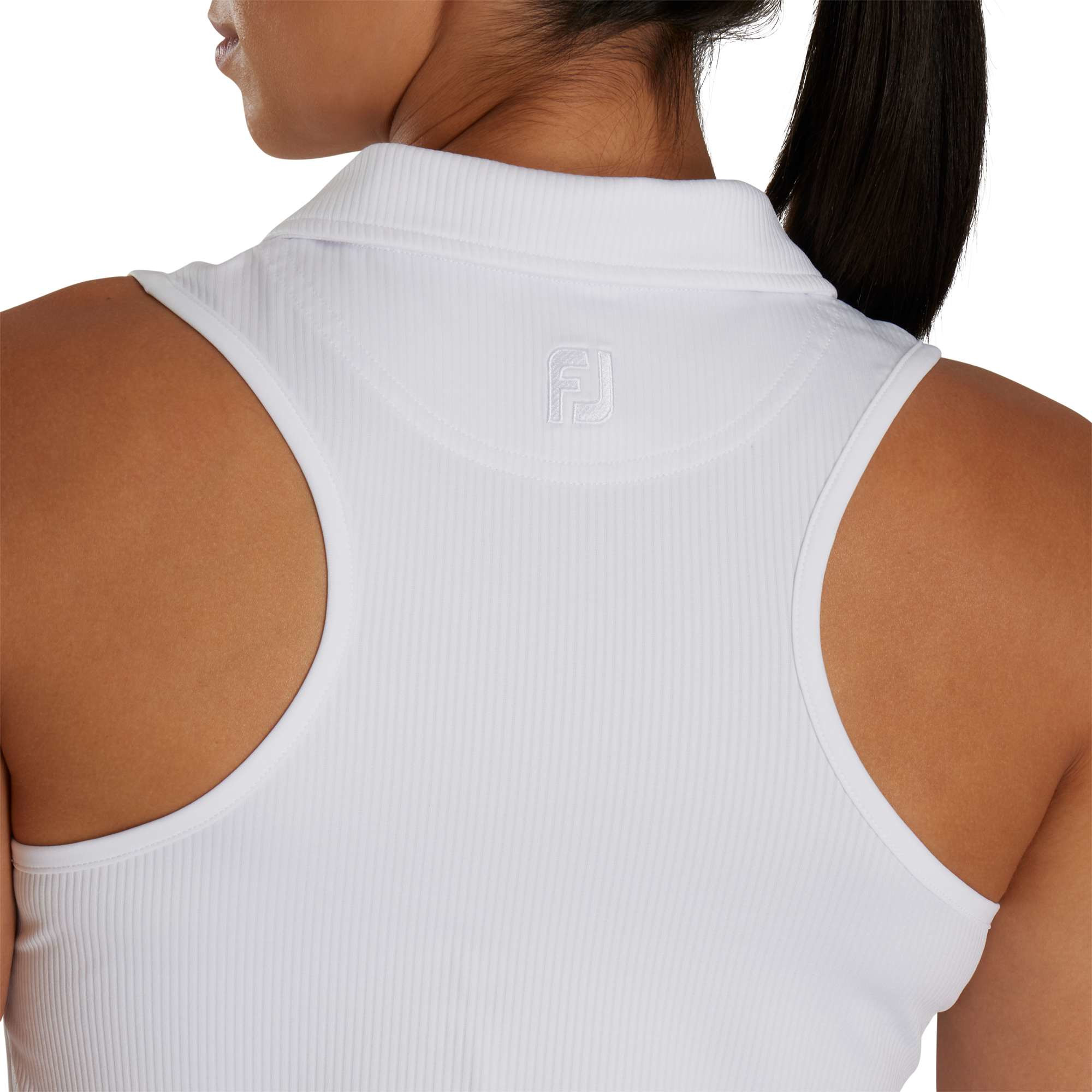 White The FootJoy® Women’s Racerback Performance Golf Tank Polo in a sporty athletic style, featuring a sleeveless racerback design, smooth neckline, and lightweight stretch fabric, designed for women’s golf and active wear.