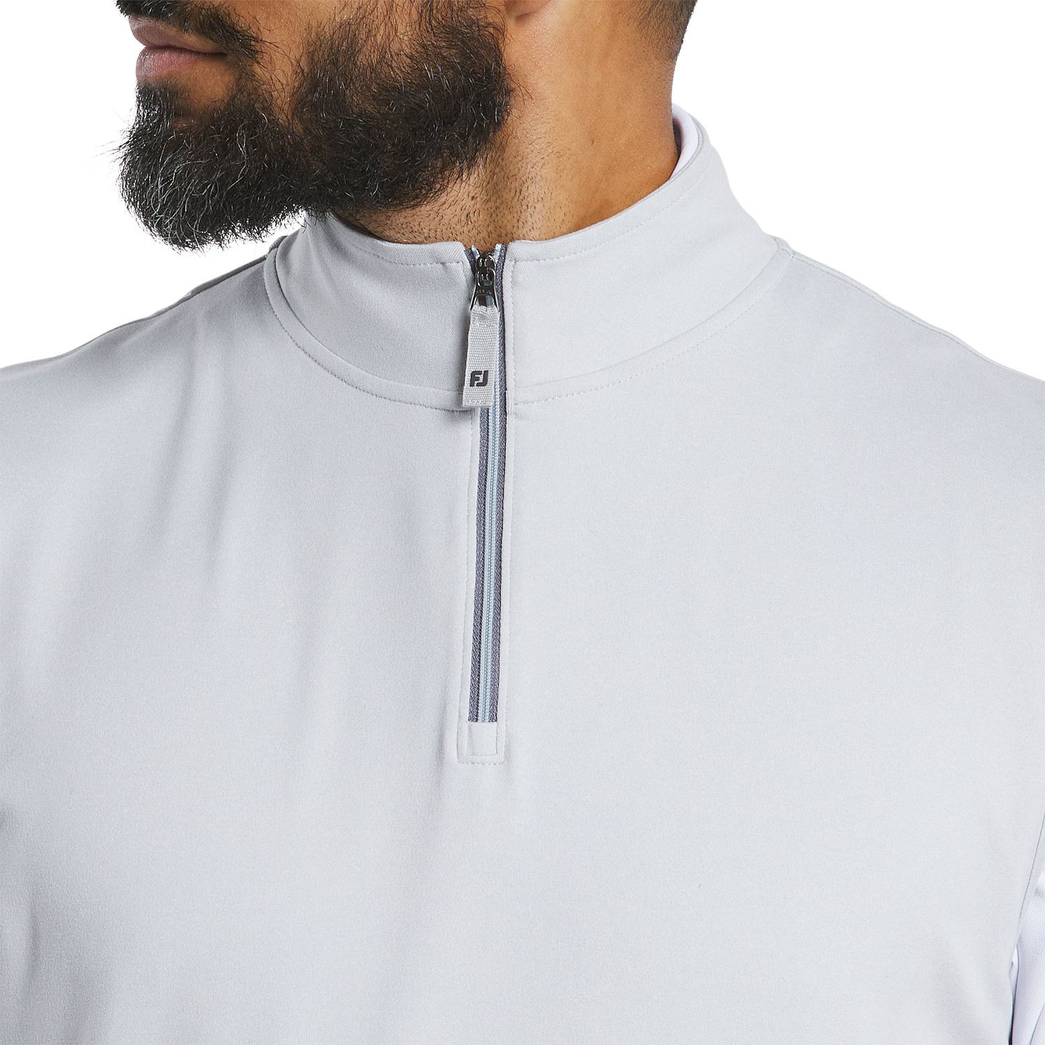 Grey FootJoy men's performance quarter-zip golf vest made from a polyester-spandex performance blend with moisture-wicking technology, four-way stretch, anti-microbial finish, and lightweight construction for golf and everyday wear.