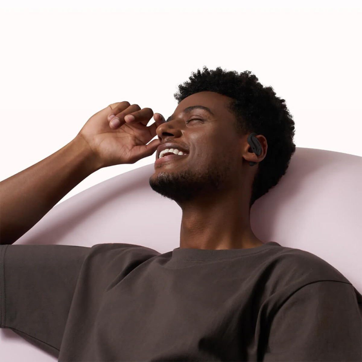 Black open-ear true wireless earbuds with ergonomic ear hooks, secure wobble-free fit, MultiPoint pairing, and extended battery life.