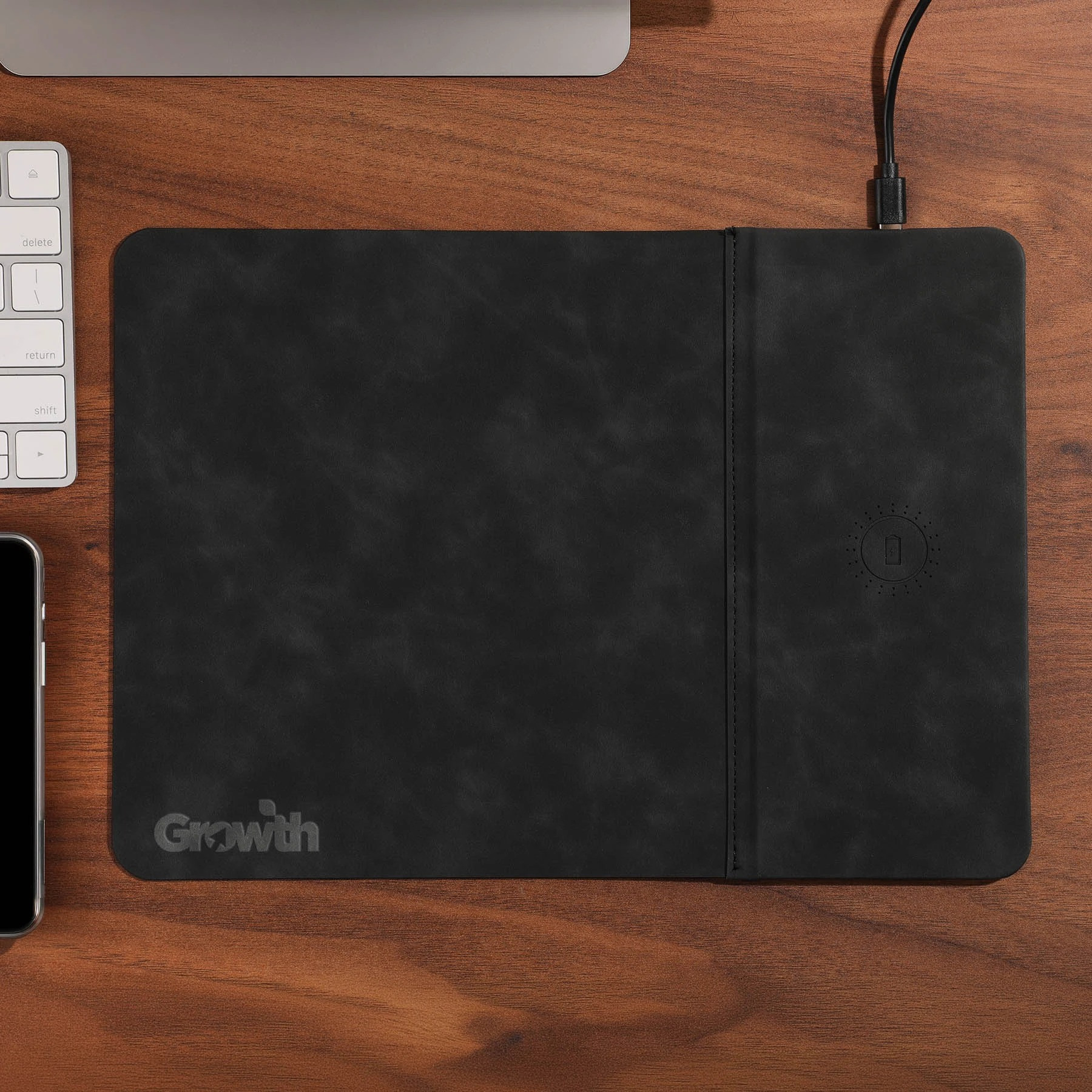 Black Nowire Pro Wireless Mousepad, a full-size black PU mousepad with a smooth soft-touch surface and integrated up to 15W wireless charging area for a clean, cable-free workspace.