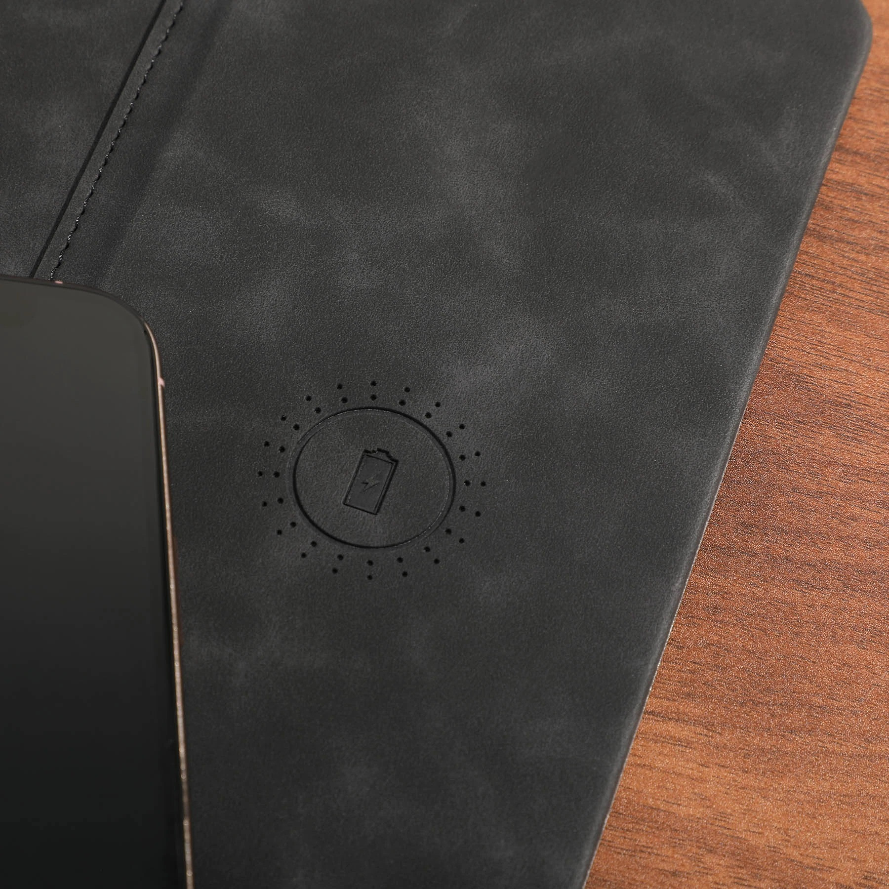 Black Nowire Pro Wireless Mousepad, a full-size black PU mousepad with a smooth soft-touch surface and integrated up to 15W wireless charging area for a clean, cable-free workspace.