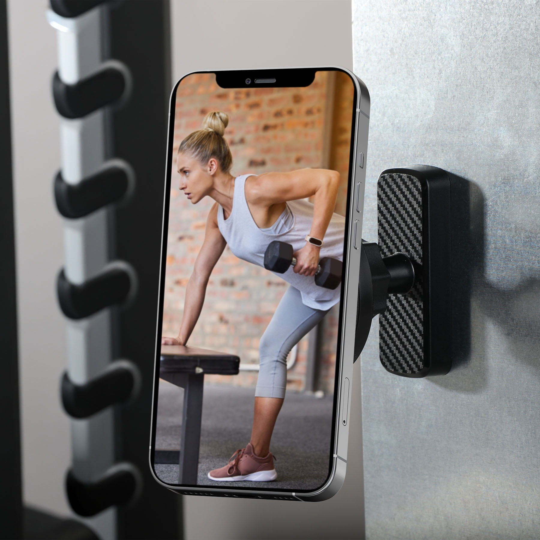 Black MagGrab Magnetic Phone Mount with compact silver circular design, built-in phone-holding magnet, adjustable viewing angle, and metal-gripping back for mounting phones on golf carts, garages, and other metal surfaces.