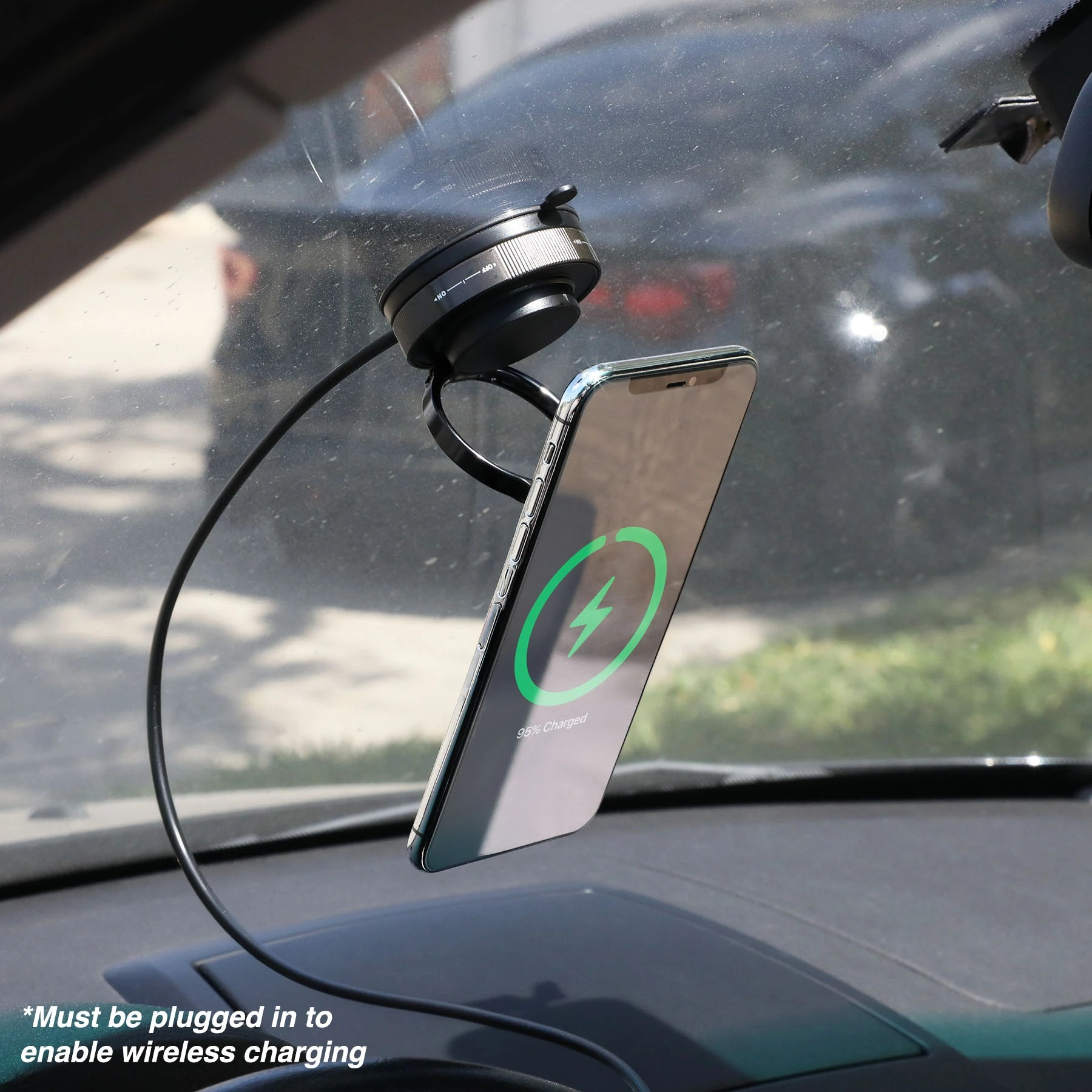 Black Lunogrip Charge Phone Stand & Wireless Charger in black, compact adjustable design with a magnetic charging pad and suction cup base for hands-free phone charging on smooth surfaces.