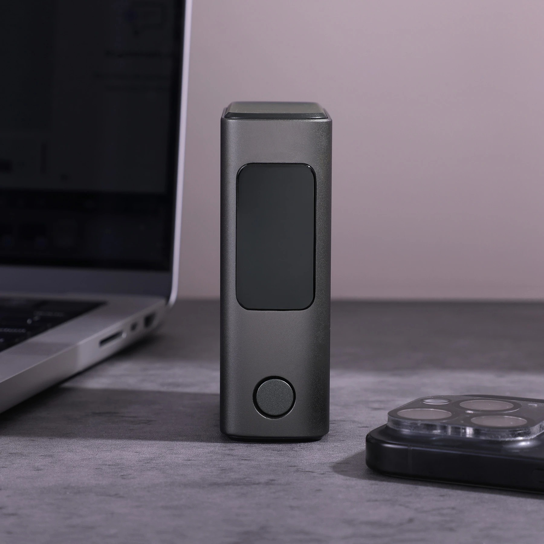 Black Big Daddy Laptop Power Bank in a compact black recycled-material shell, featuring a 10,000mAh battery and 45W charging output for laptops, smartphones, tablets, and other compatible devices.