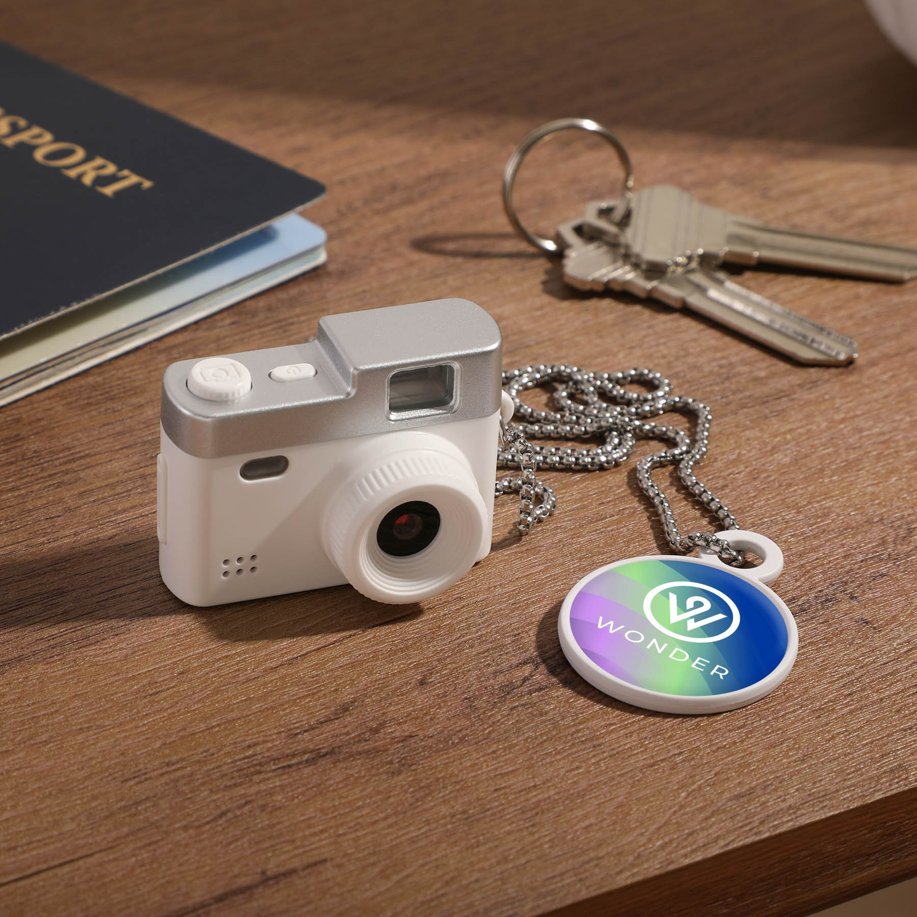 White Cutie Cam Mini Camera, compact portable camera with a fun mini design, featuring a small display and simple controls for capturing photos and 1080p video.