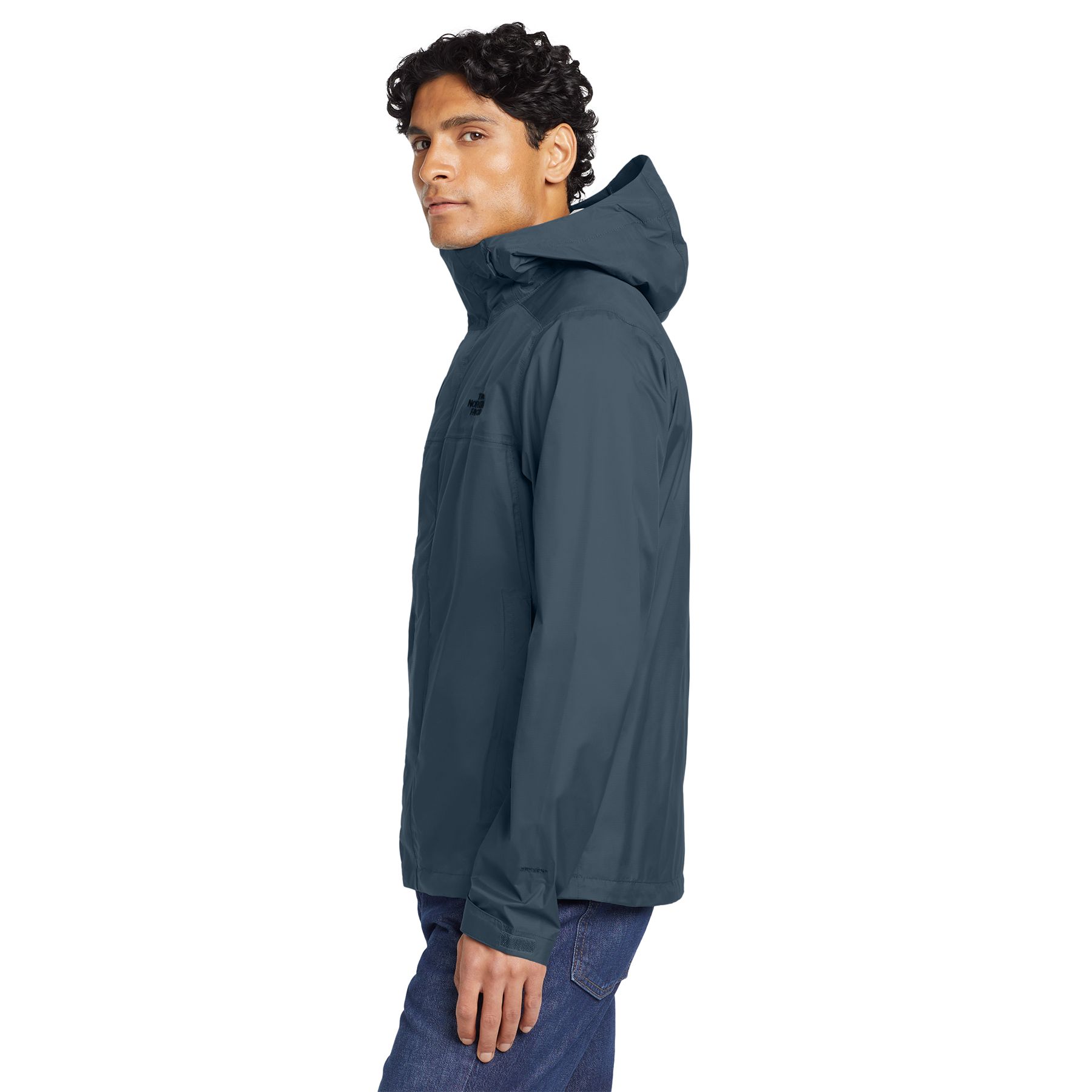Shady Blue The North Face® DryVent Rain Jacket in a solid color, featuring a waterproof recycled nylon ripstop shell, adjustable hood, front zipper with storm flap, zippered hand pockets, pit-zip vents, and adjustable cuffs, designed for outdoor rain and wind protection.