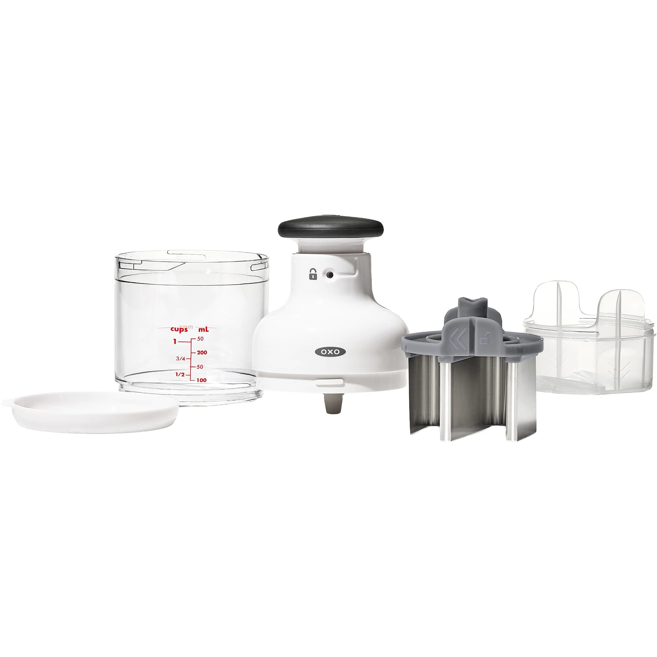 White OXO Good Grips Chopper, white plastic food chopper with a clear measurement-marked catcher cup and pump-action knob, featuring a rotating stainless steel blade for chopping vegetables, herbs, nuts, and other ingredients.