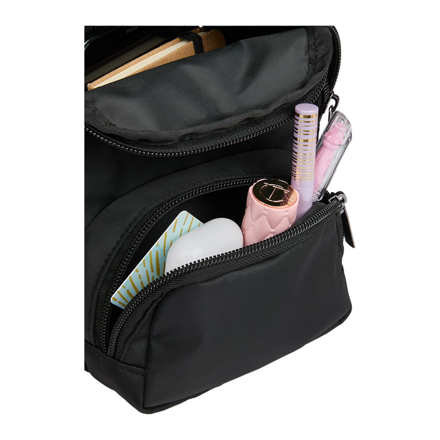 Black travel sling made from 100% recycled 290D twill fabric with a spacious main compartment, interior mesh pocket, front zippered pocket, and adjustable crossbody strap.