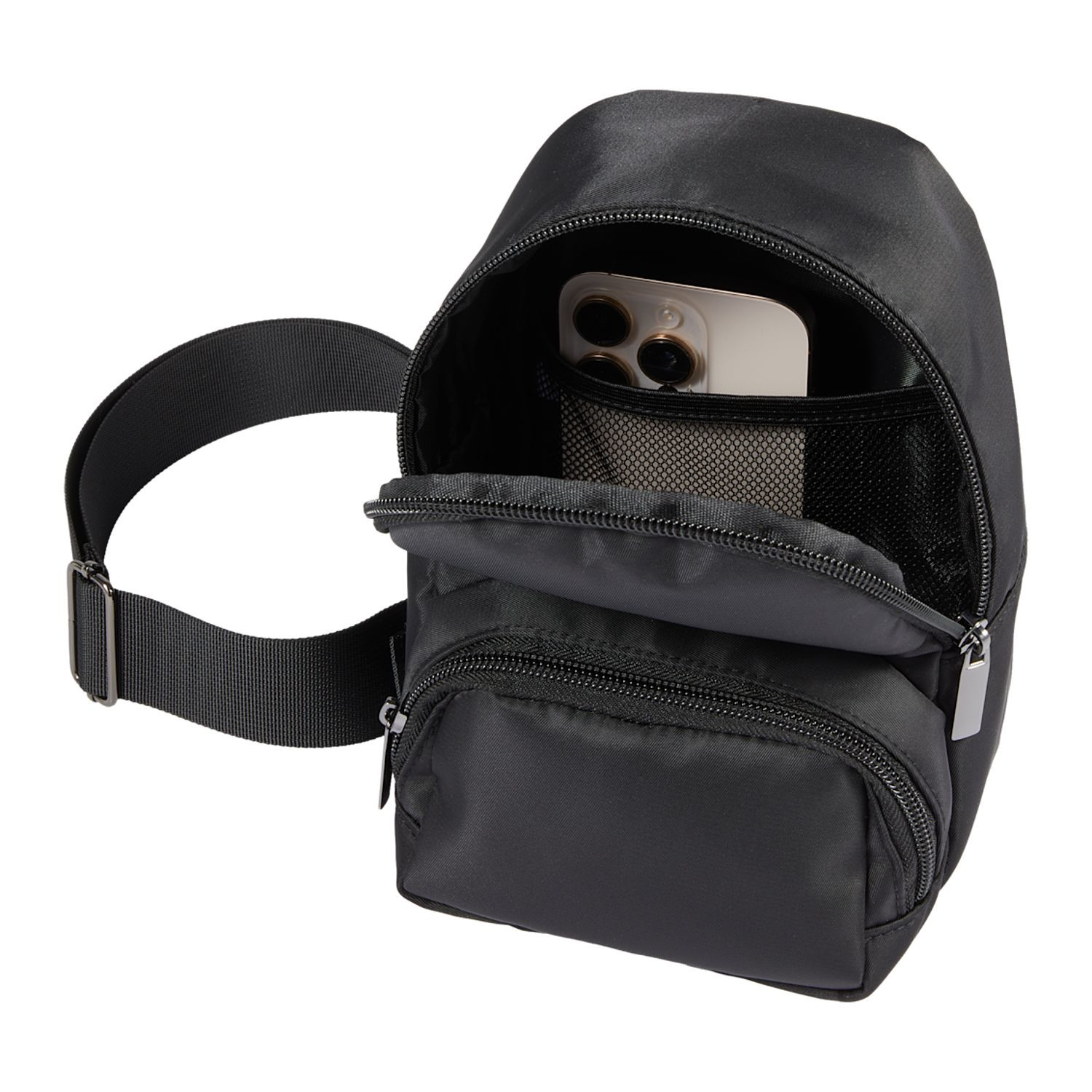 Black travel sling made from 100% recycled 290D twill fabric with a spacious main compartment, interior mesh pocket, front zippered pocket, and adjustable crossbody strap.