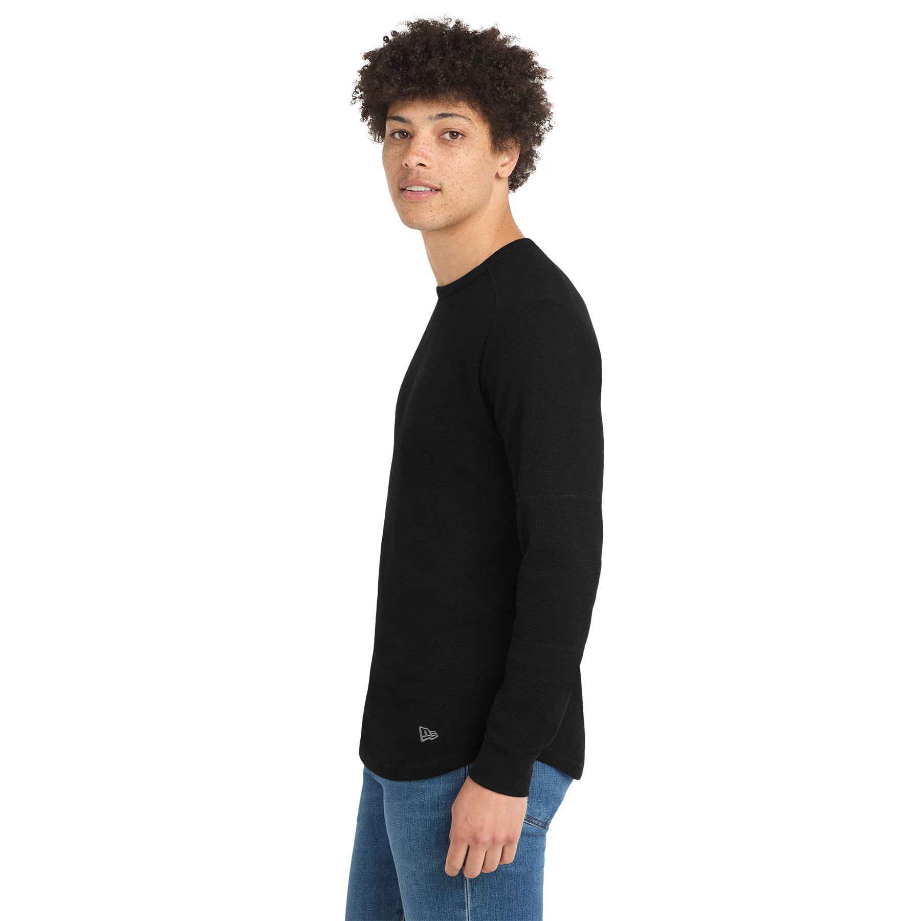 Black New Era thermal shirt in a cotton-polyester blend, featuring a classic solid-color design with rib-knit neck binding and cuffs, an embroidered New Era flag logo at the left hem, and a comfortable fit for layering at work, sporting events, or casual wear.