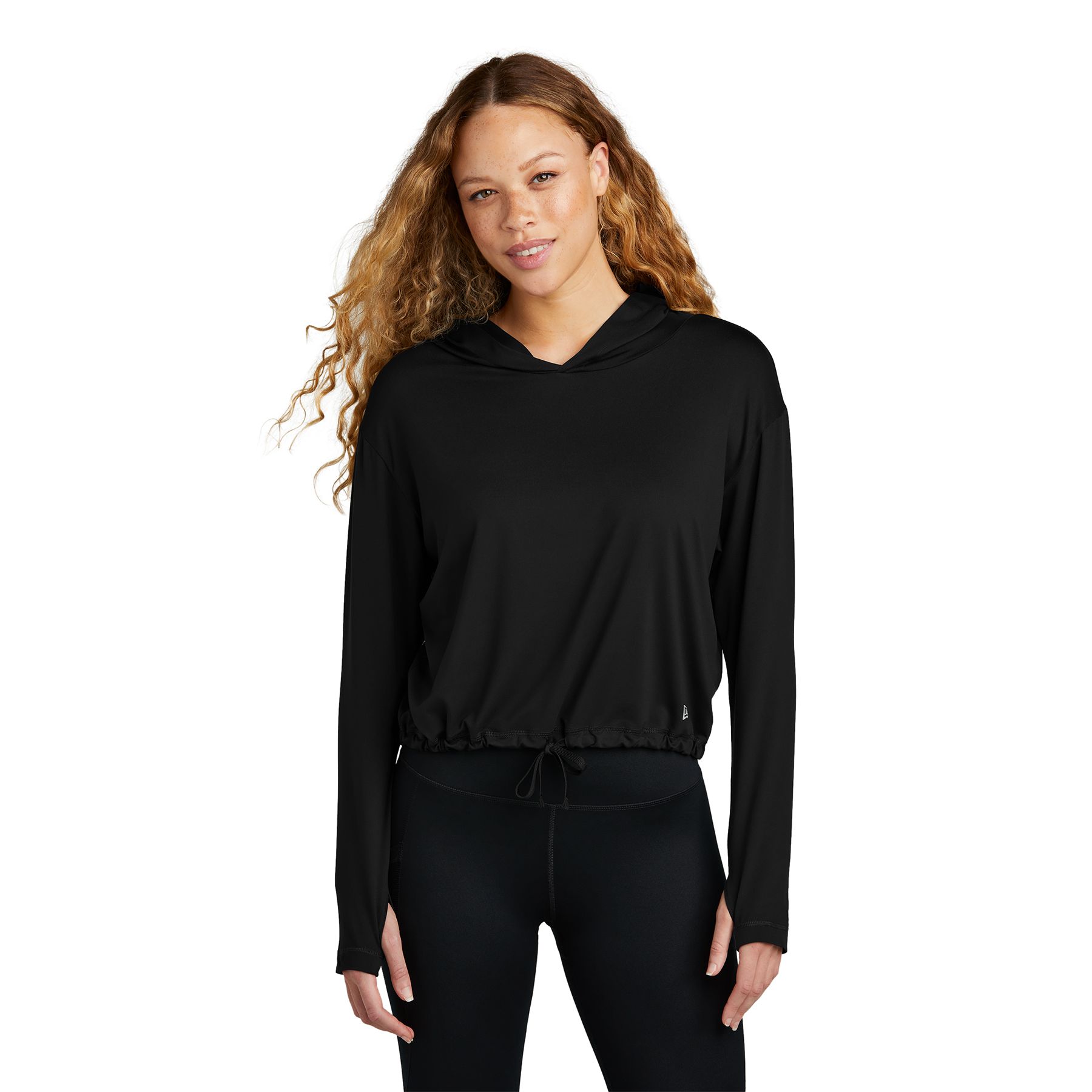 Back New Era Women's Power Long Sleeve Hoodie, featuring a lightweight polyester-spandex stretch fabric, 3-panel hood, long sleeves with thumbholes, high-hip hem with adjustable cinch drawcords, and a subtle reflective silver logo at the left hem, designed for activewear and everyday comfort.