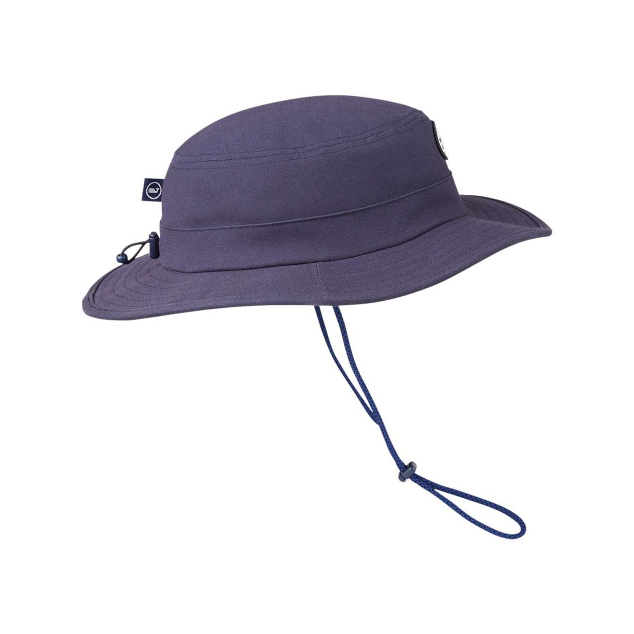 Vineyard Navy Vineyard Vines® Unisex Surf Patch Canvas Bucket Hat in cotton canvas, featuring a surf-inspired patch graphic, side ventilation grommets, a chin strap with plastic clip, and a whale logo label tab, designed for casual outdoor and beach wear.