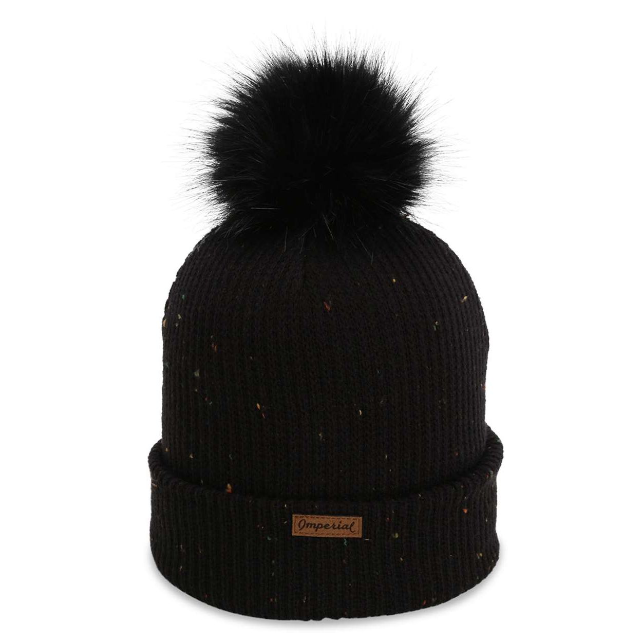 Black Imperial The Montage Pom Knit in confetti-flecked yarn with a soft grey fleece lining, matching faux fur pom-pom, and suede patch on the cuff, designed as a warm acrylic-polyester winter beanie.