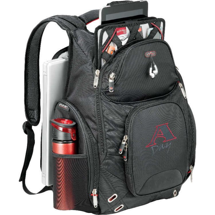 TSA-friendly elleven™ computer backpack in black with a spacious zippered main compartment, padded laptop and tablet storage, multiple organized pockets, insulated side pocket, and padded adjustable shoulder straps. Features a flat-opening laptop compartment for airport security screening, a luggage trolley sleeve, and signature elleven™ lining and hardware, ideal for business travel, commuting, and everyday work.