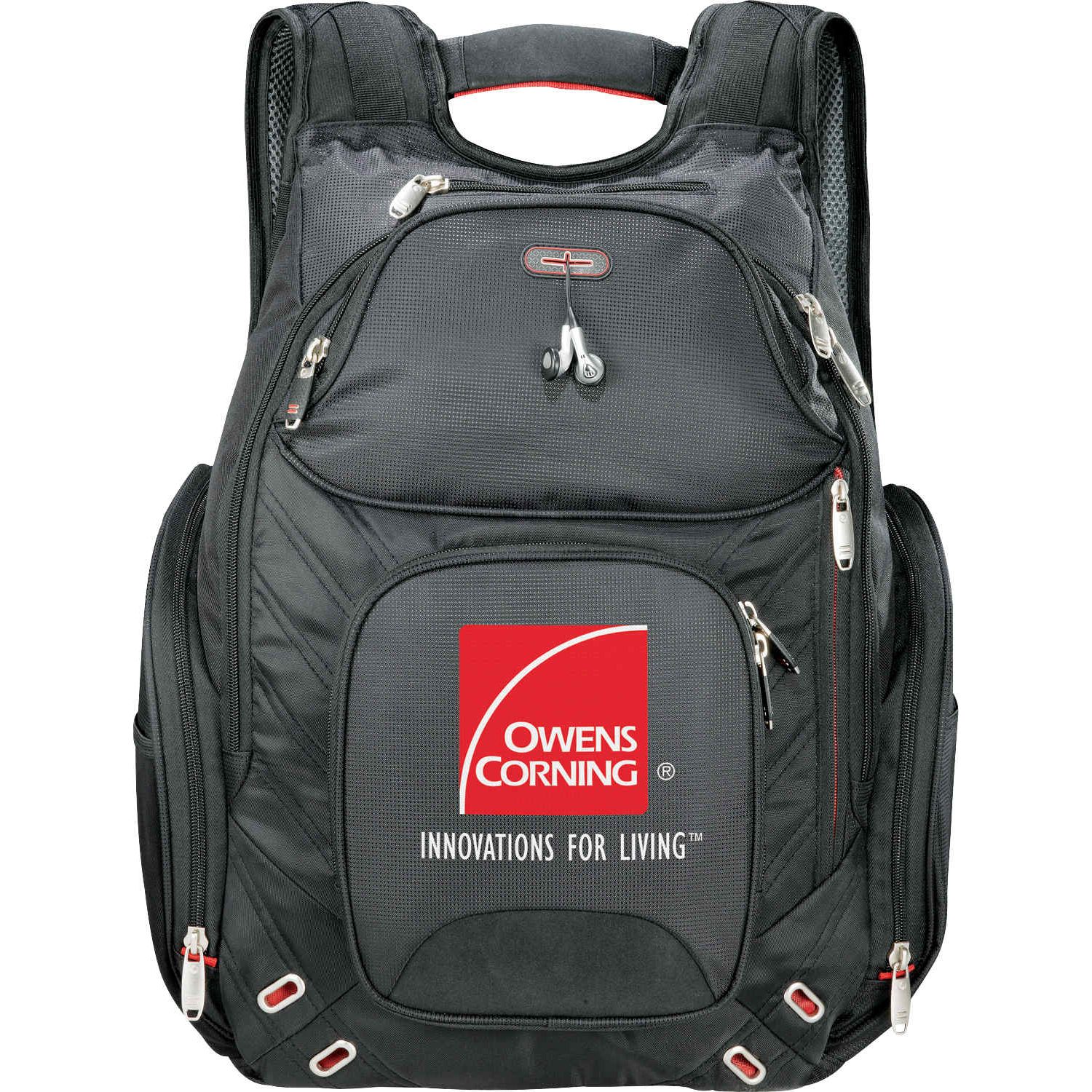TSA-friendly elleven™ computer backpack in black with a spacious zippered main compartment, padded laptop and tablet storage, multiple organized pockets, insulated side pocket, and padded adjustable shoulder straps. Features a flat-opening laptop compartment for airport security screening, a luggage trolley sleeve, and signature elleven™ lining and hardware, ideal for business travel, commuting, and everyday work.