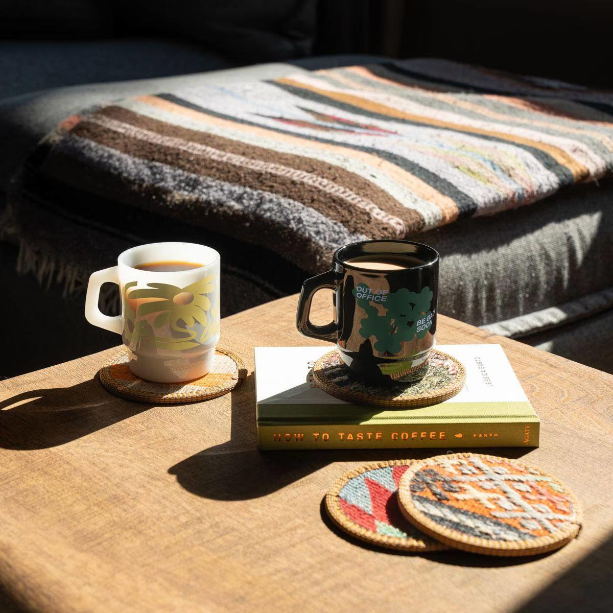 vintage-inspired glass mug with a curved handle, classic milk glass finish, and 8 oz capacity for coffee, tea, and other hot or cold beverages.