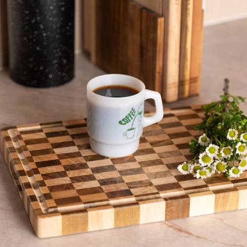 vintage-inspired glass mug with a curved handle, classic milk glass finish, and 8 oz capacity for coffee, tea, and other hot or cold beverages.