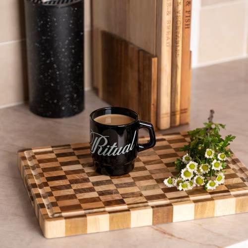 vintage-inspired glass mug with a curved handle, classic milk glass finish, and 8 oz capacity for coffee, tea, and other hot or cold beverages.