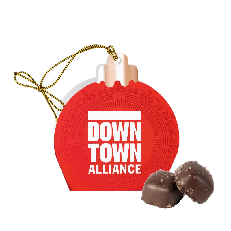 Jingle Treats Ornament with Sea Salt Caramels featuring a festive ornament-shaped gift box with colorful holiday printing, containing three individually wrapped sea salt caramels in milk or dark chocolate, ideal for seasonal gifting and custom branded corporate giveaways.