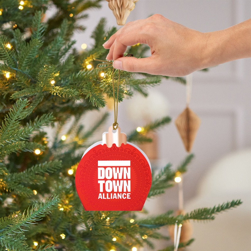 Jingle Treats Ornament with Sea Salt Caramels featuring a festive ornament-shaped gift box with colorful holiday printing, containing three individually wrapped sea salt caramels in milk or dark chocolate, ideal for seasonal gifting and custom branded corporate giveaways.