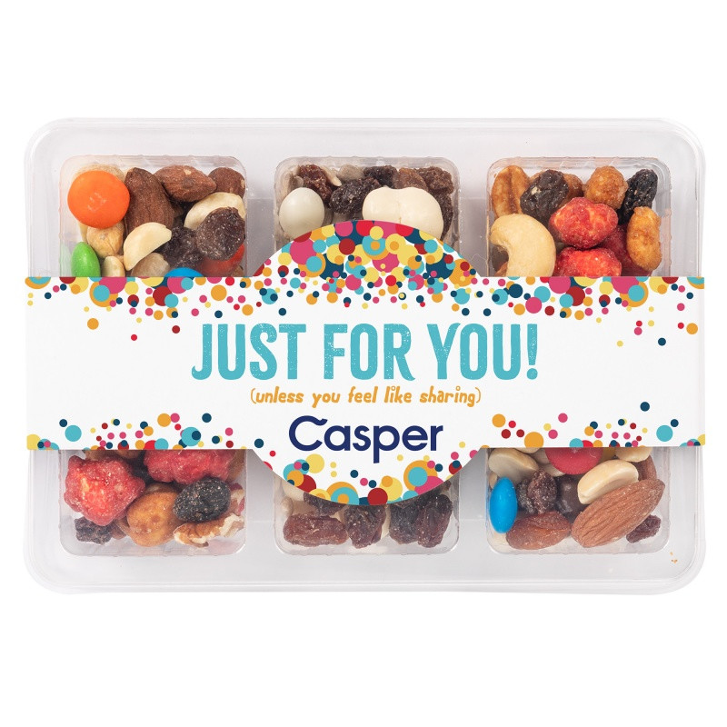 Clear mini tackle box with six compartments containing Rainbow Delight, yogurt raisin trail mix, and energy trail mix, featuring a customizable full-color sleeve.