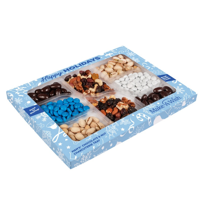 Custom Premium snack gift box featuring an assortment of Champions Mix, colorful M&M’S® candies, dark chocolate-covered almonds, and roasted salted pistachios. Packaged in a full-color, die-cut custom box with vibrant printed graphics, this sweet and savory snack collection is ideal for executive gifts, holiday appreciation, and client thank-you presents.