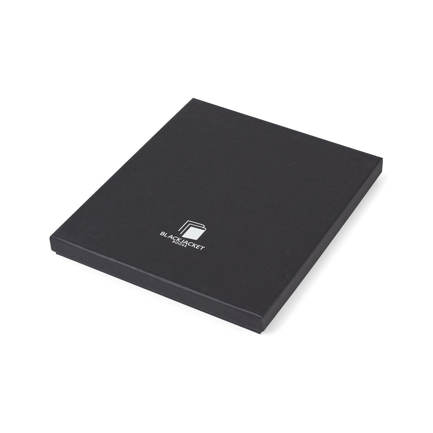 Box of Black Moleskine Large Cahier Journal and GO Pen Gift Set featuring three large ruled notebooks bundled together with a coordinating GO Pen in a two-piece gift box. The minimalist design offers a professional look for note-taking, journaling, meeting notes, and project planning. The FSC-certified notebooks and gift packaging support responsible material sourcing, making this set a practical choice for office use and corporate gifting.