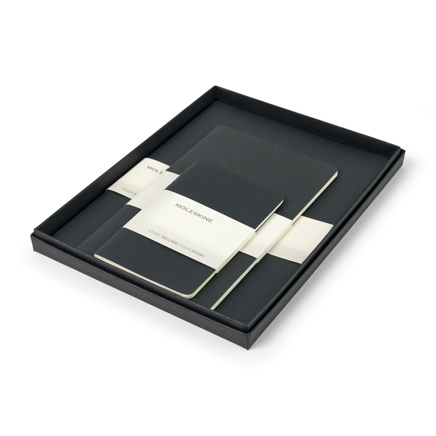 Black assorted journal gift set featuring three ruled notebooks in pocket, large, and extra-large sizes, packaged in a matching gift box.
