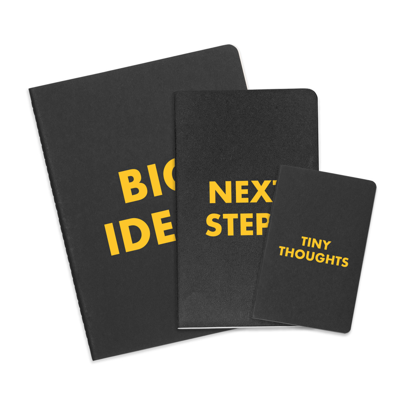 Black assorted journal gift set featuring three ruled notebooks in pocket, large, and extra-large sizes, packaged in a matching gift box.
