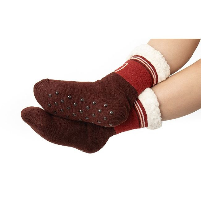 Custom Sherpa-lined socks featuring a custom jacquard knit exterior, an ultra-soft black or white sherpa lining, and non-slip grip dots on the soles for added traction. Designed like cozy slippers with the flexibility of socks, these one-size-fits-all socks can be customized with embroidery or patches for warmth and comfort during colder months.