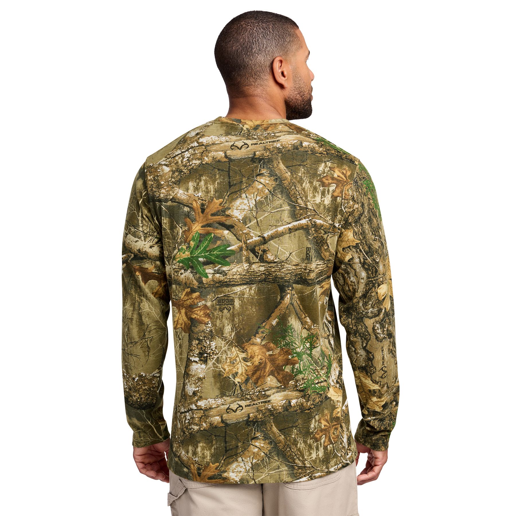 Realtree Edge Long-sleeve Realtree EDGE® camouflage pocket T-shirt made from 5.5-ounce, 100% ring-spun combed cotton for a soft, comfortable feel. Features an outdoor-inspired camouflage pattern, a left chest pocket, a ribbed collar with reinforced stitching, shoulder-to-shoulder neck taping, and an exterior woven hem tab. Designed for outdoor work, casual wear, and custom-branded promotional apparel.