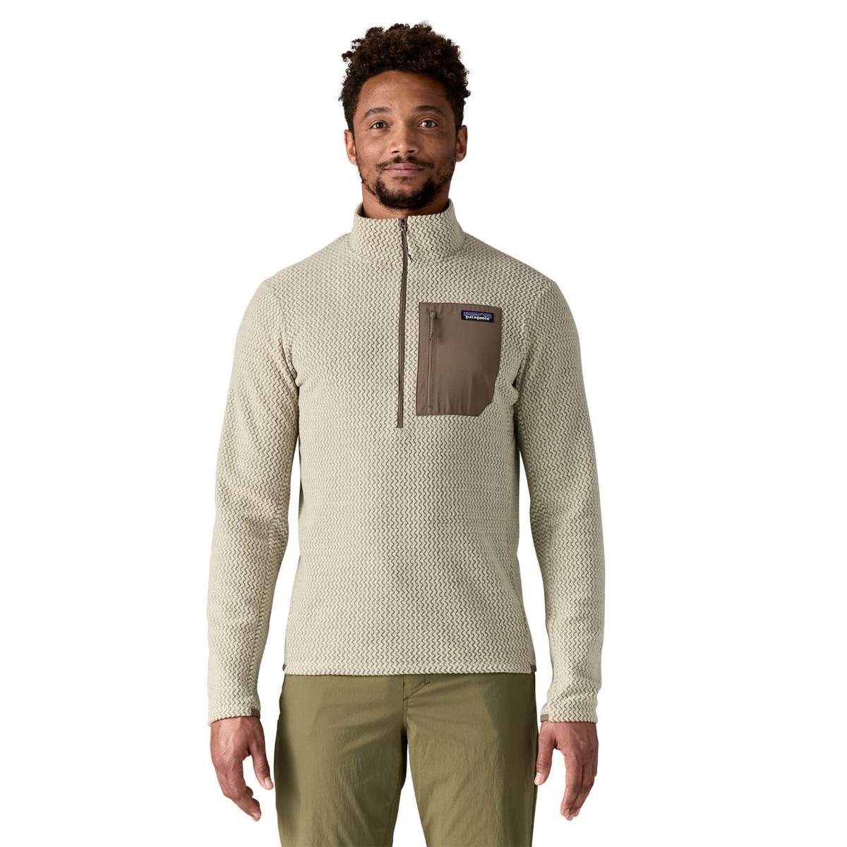 Pelican Lightweight recycled polyester fleece with a breathable zigzag-knit design, quarter-zip, zippered chest pocket, and soft cuffs for comfortable layering.