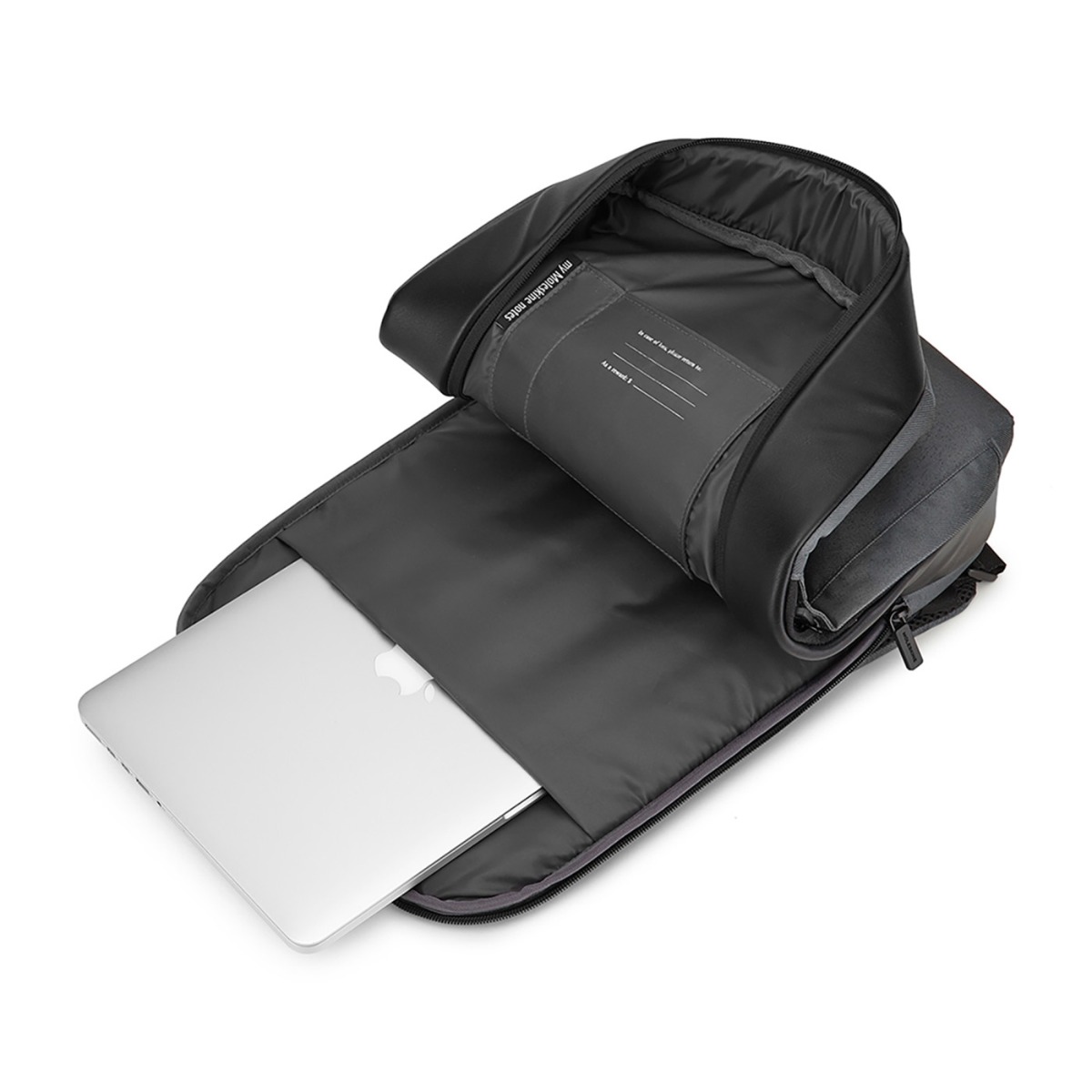 Slate Gray Moleskine® Notebook Backpack in a slim, sleek design, featuring a black water-resistant exterior, padded adjustable shoulder straps, breathable mesh back, and multiple zippered and interior pockets for organizing a laptop, tablet, notebooks, pens, and travel essentials.